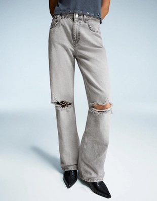 Джинсы с широкими штанинами и разрезами- Заказать в России