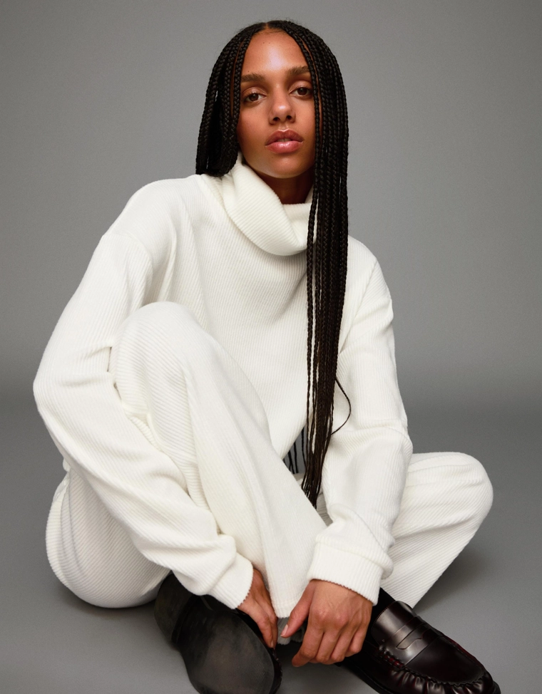 Свитер в рубчик с высоким воротником