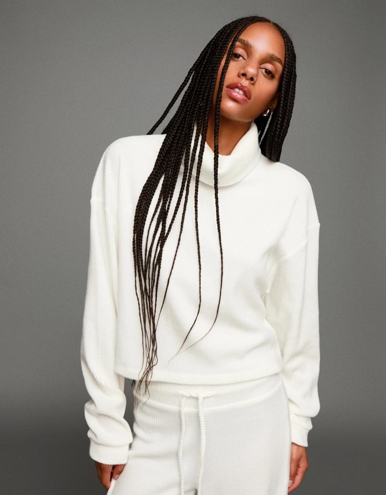 Свитер в рубчик с высоким воротником