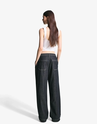 Джинсы из мягкой ткани с широкими штанинами- Заказать в России