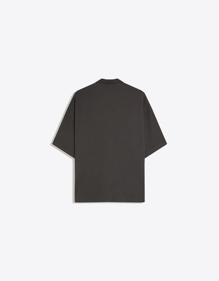 Поло геометрического кроя с короткими рукавами и принтом