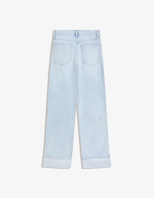 Джинсы прямого кроя с широкими штанинами и отворотами снизу- Заказать в России