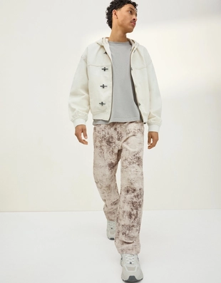 Джинсы свободного кроя с текстурным принтом- Заказать в России