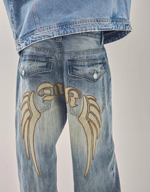 Джинсы очень свободного кроя с вышивкой- Заказать в России