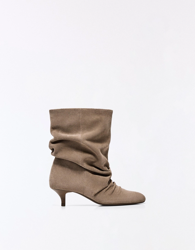 Кожаные ботильоны на каблуке