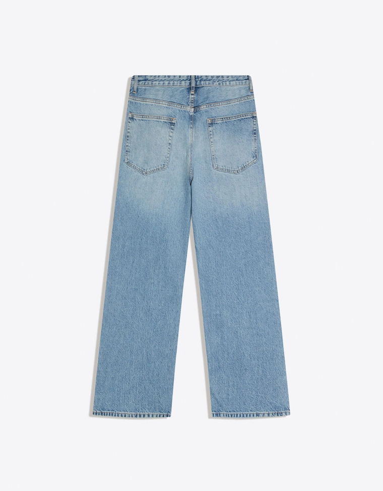 Джинсы с низкой проймой и разрывами