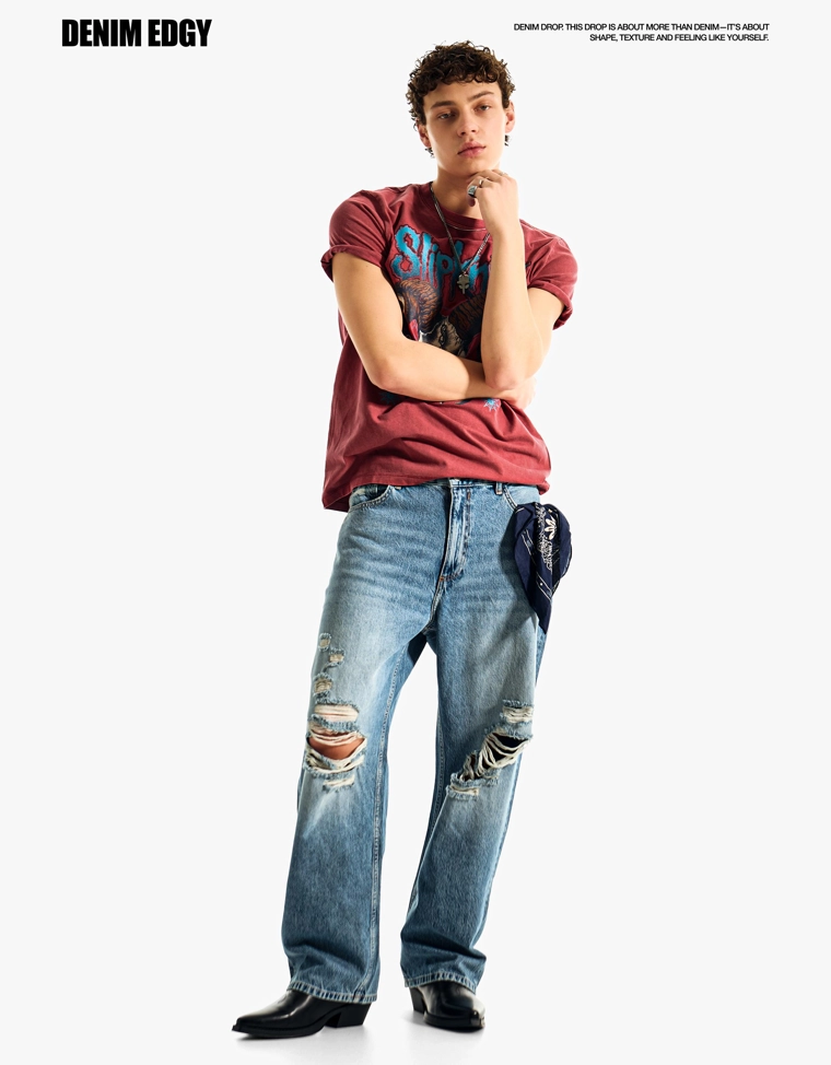 Джинсы с низкой проймой и разрывами