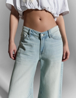 Джинсы свободного кроя с низкой посадкой- Заказать в России