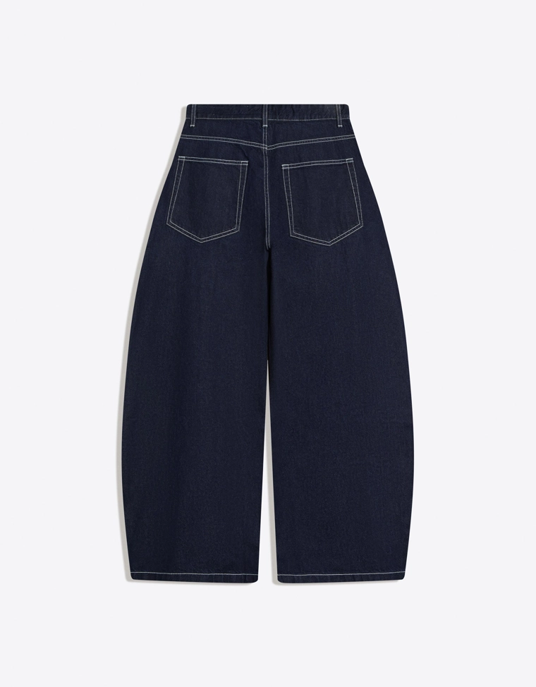 Джинсы-бананы с защипами