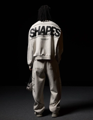 Брюки-бананы из ткани с принтом- Заказать в России