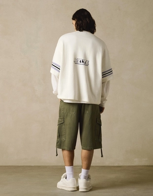 Футболка оверсайз с короткими рукавами и принтом- Заказать в России