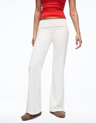 Расклешенные брюки из мягкой ткани с нашивкой- Заказать в России