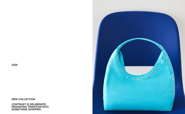 Сумка-мешок из искусственной кожи с заклепками