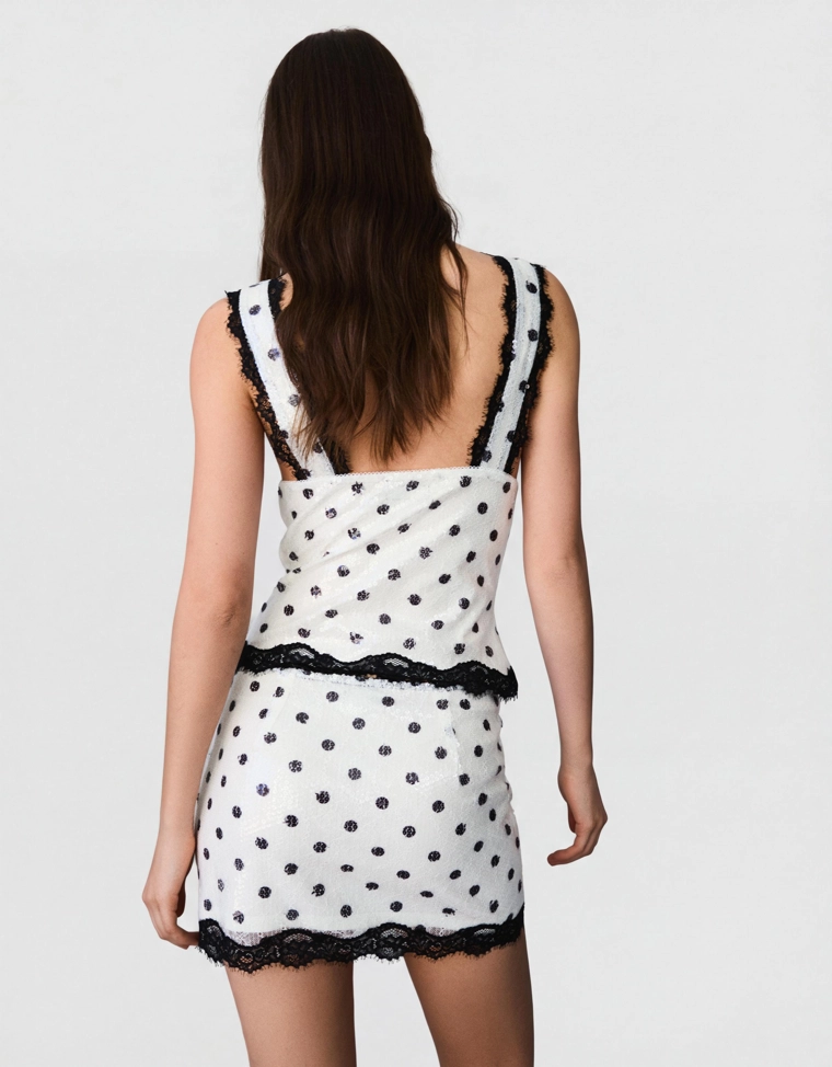 Мини-юбка с пайетками и кружевом