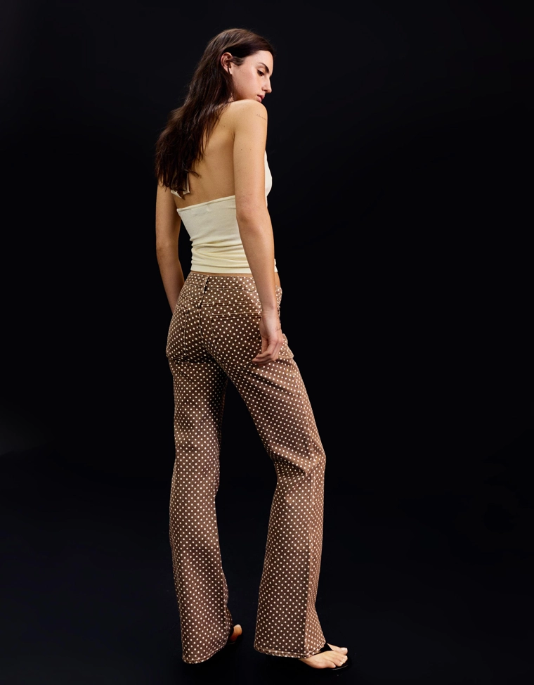 Джинсы клеш в горошек