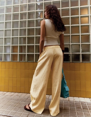 Брюки из струящейся ткани в полоску- Заказать в России