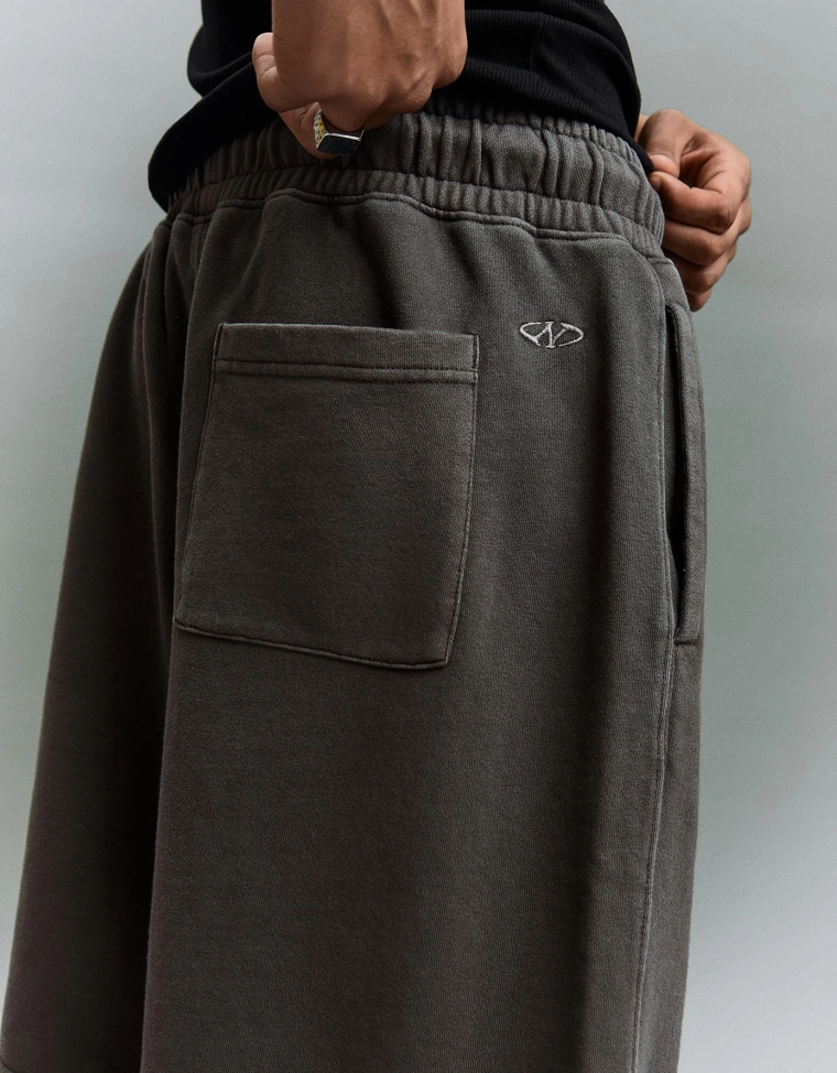 Шорты геометрического кроя с эффектом потертости