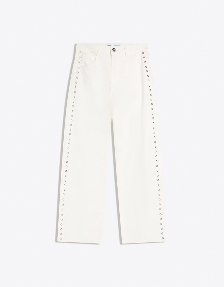 Джинсы свободного кроя с низкой посадкой и заклепками