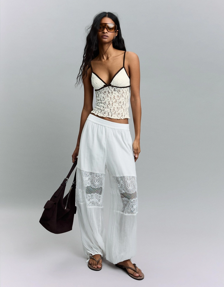 Кружевной топ на бретелях с бантом