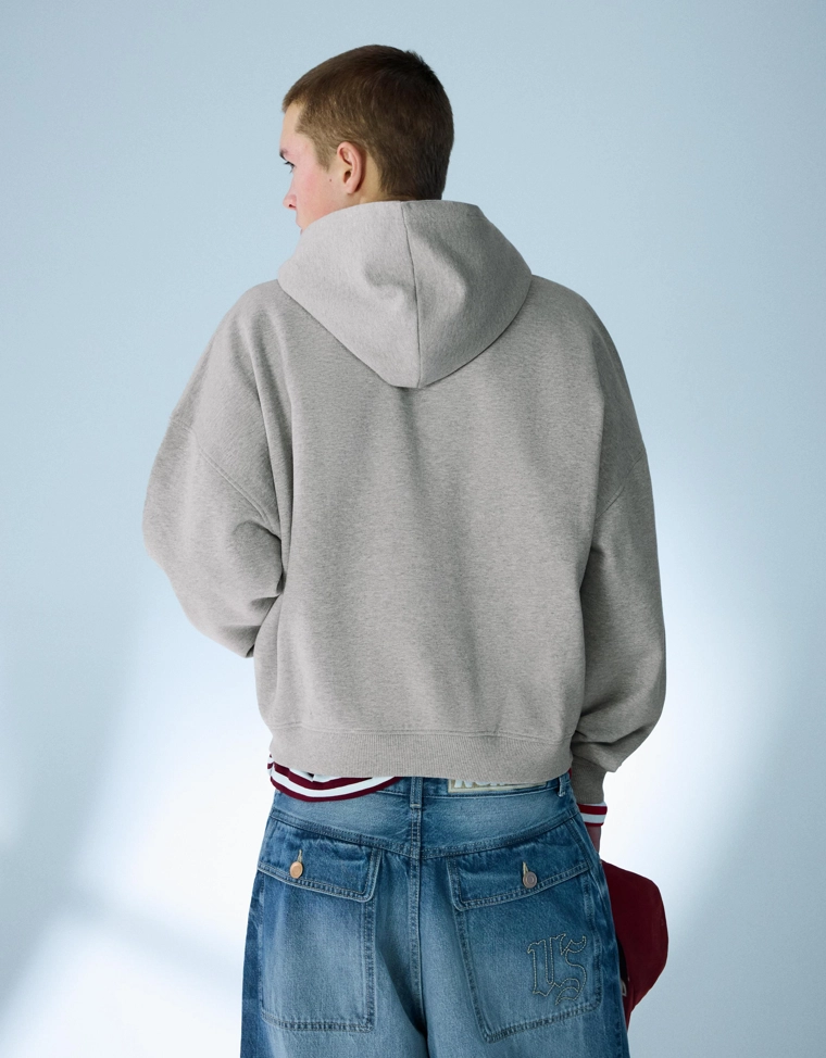 Укороченная толстовка геометрического кроя на молнии с принтом