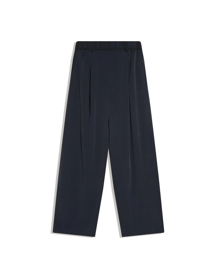 Объемные струящиеся брюки с защипами