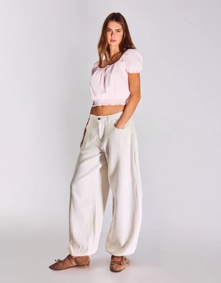 Джинсы-бананы с широкими штанинами и низкой посадкой- Заказать в России