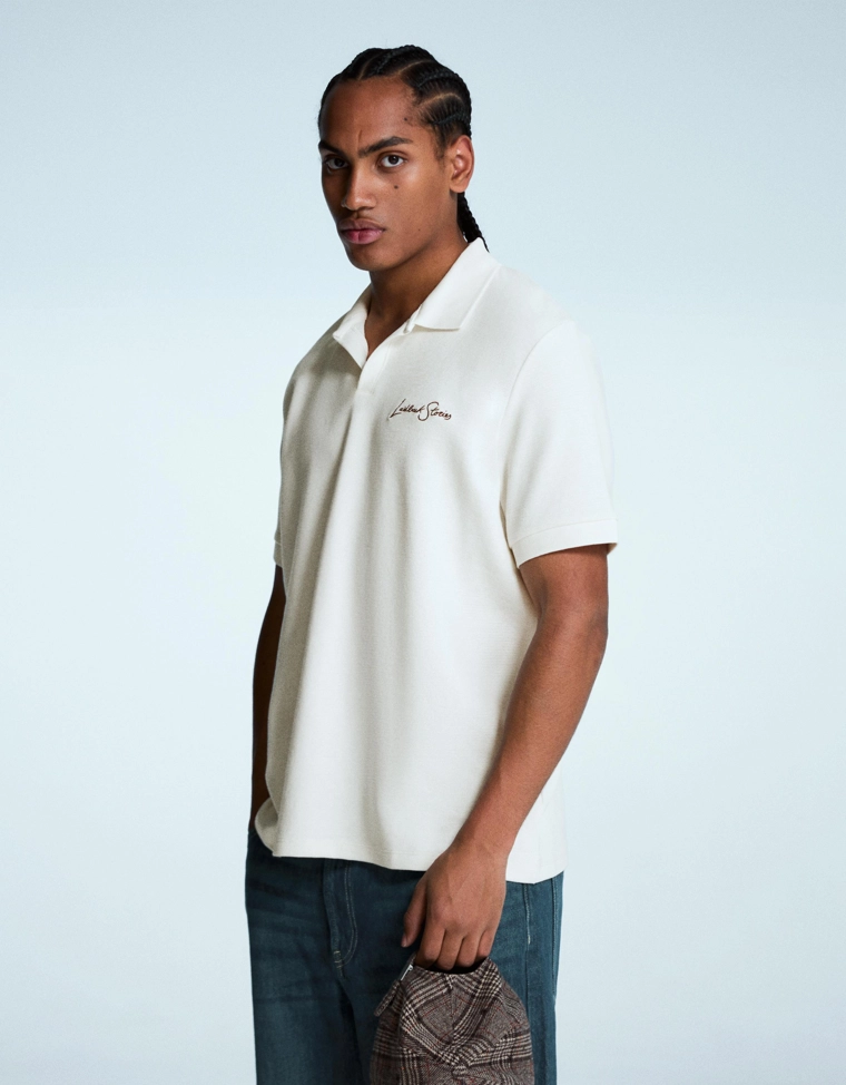 Поло с короткими рукавами и вышивкой