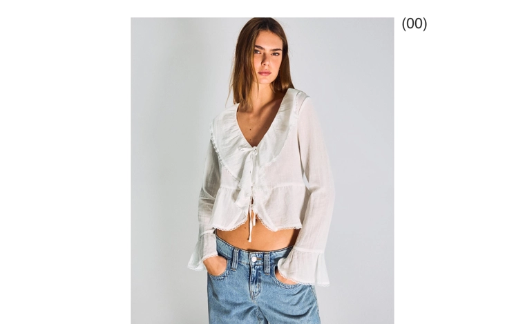 Блуза в стиле рустик с длинными рукавами и воланами