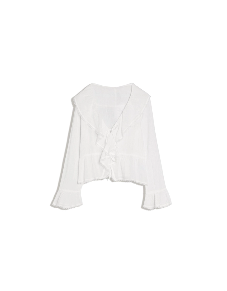 Блуза в стиле рустик с длинными рукавами и воланами