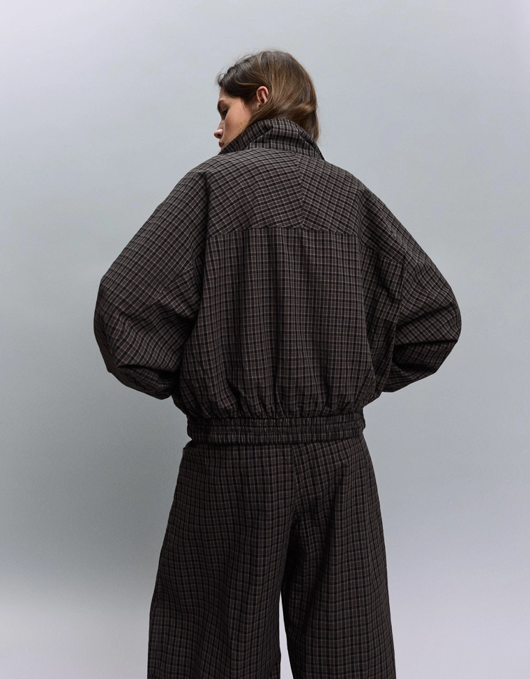 Куртка в клетку с принтом