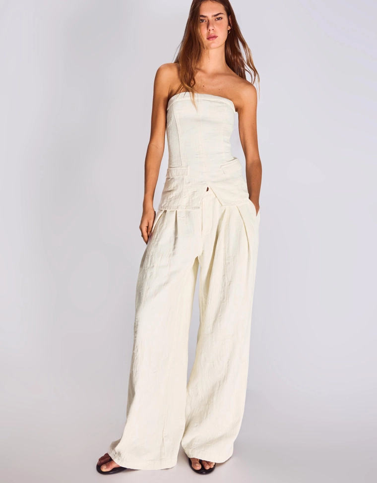 Джинсы свободного кроя с защипами и низкой посадкой