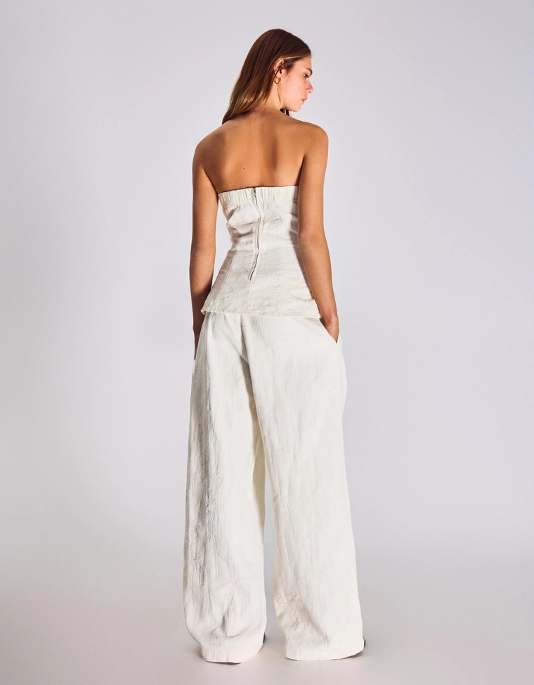 Джинсы свободного кроя с защипами и низкой посадкой