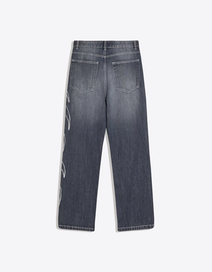 Джинсы свободного кроя с нашивками- Заказать в России