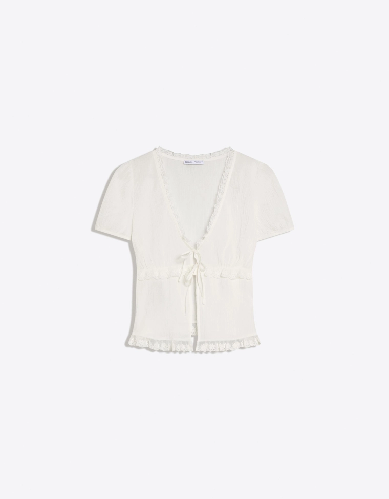 Блуза с короткими рукавами и завязками