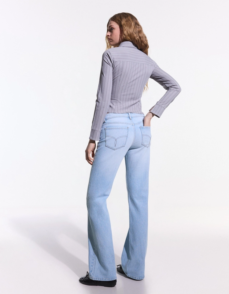 Расклешенные джинсы с низкой посадкой