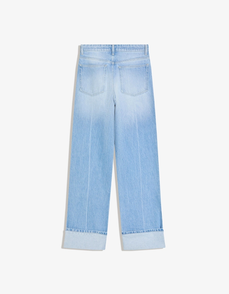 Джинсы прямого кроя с широкими штанинами и отворотами снизу