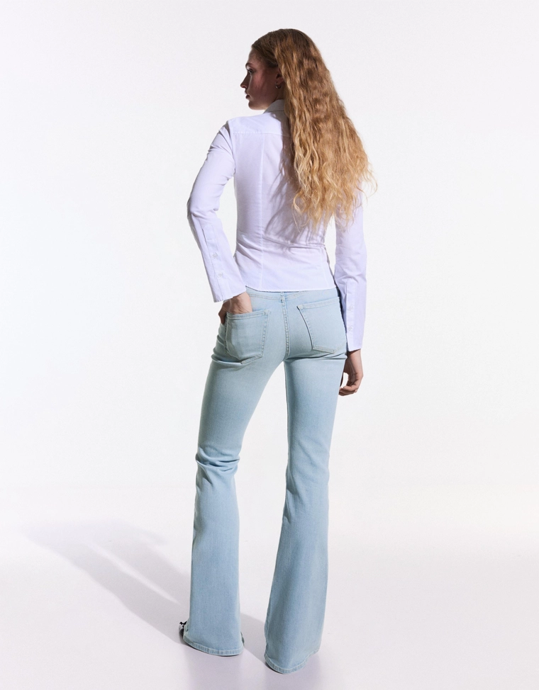 Расклешенные джинсы с высокой посадкой