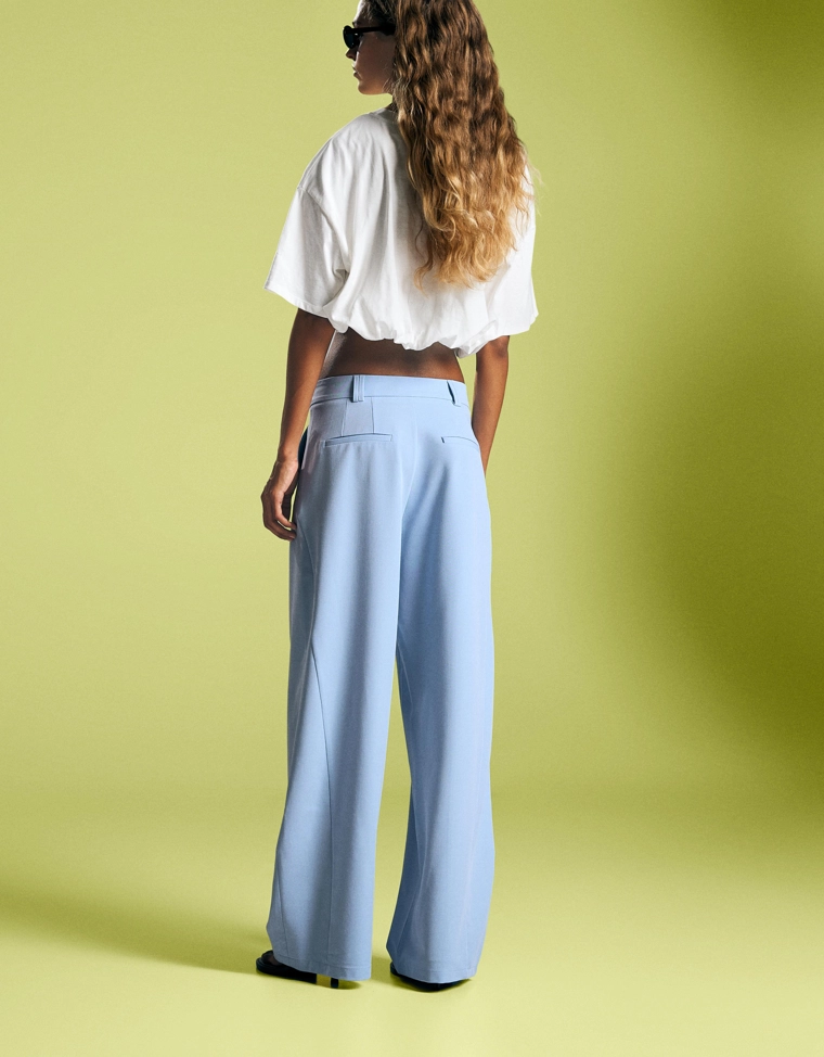 Брюки объемного кроя из двухслойной ткани