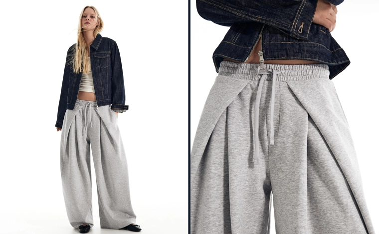 Брюки из плотной синтетической ткани свободного кроя с фиксаторами