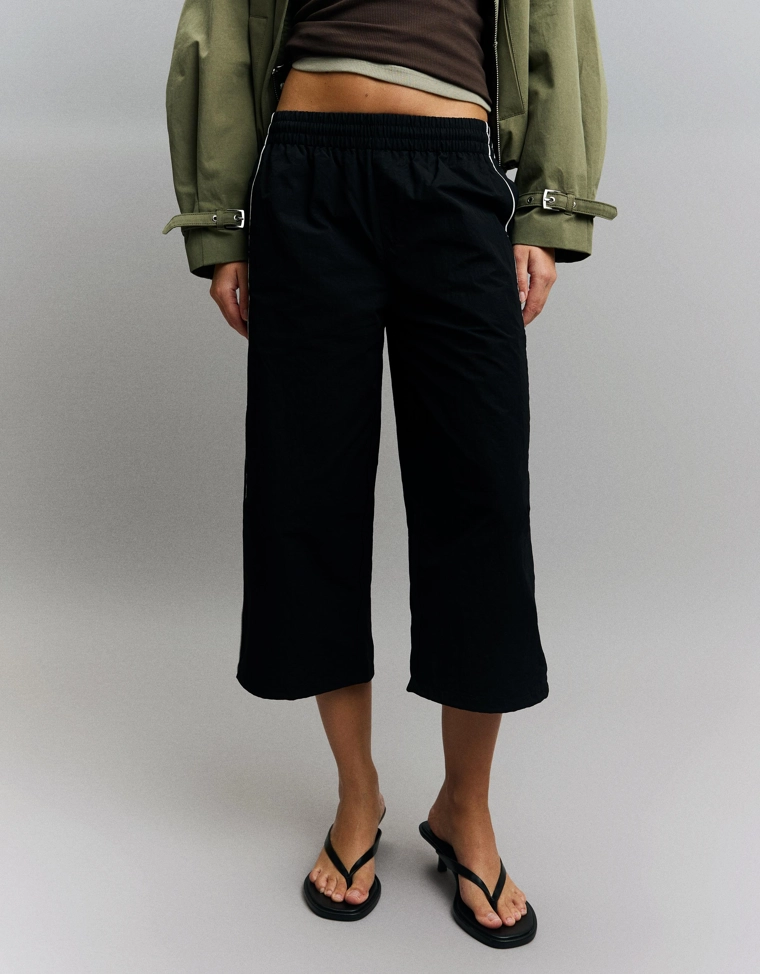 Высокотехнологичные брюки капри с фиксаторами