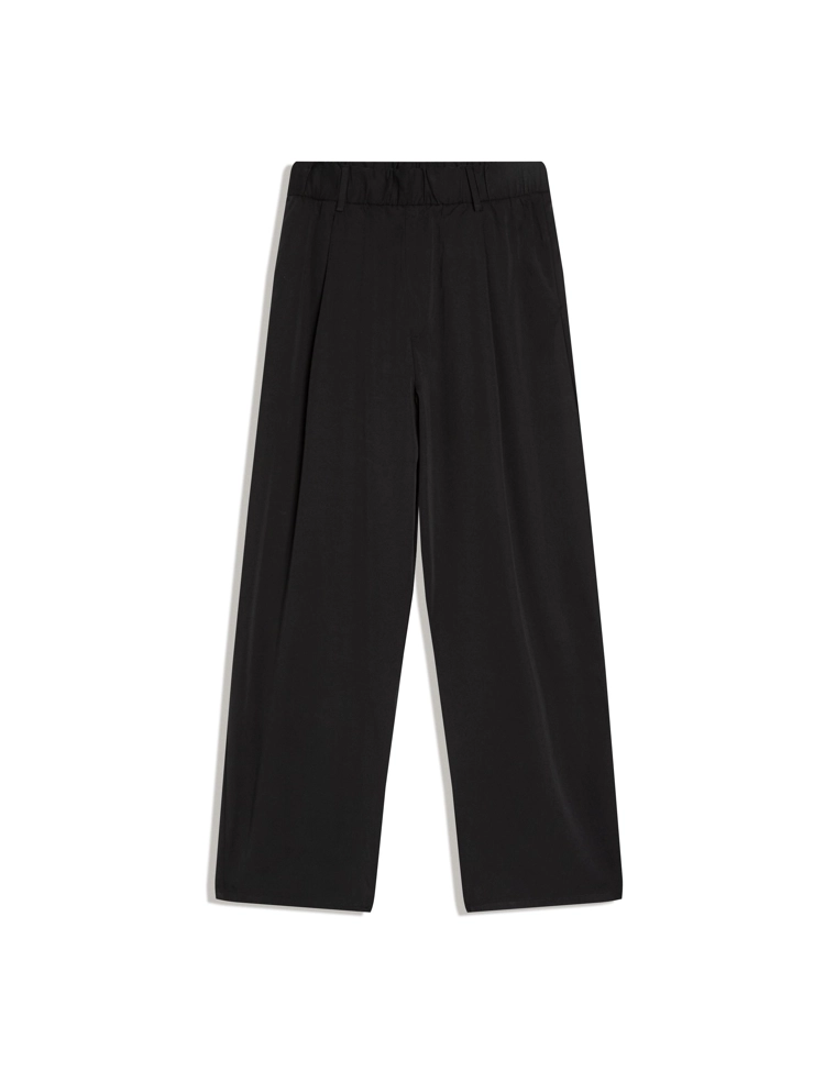 Объемные струящиеся брюки с защипами