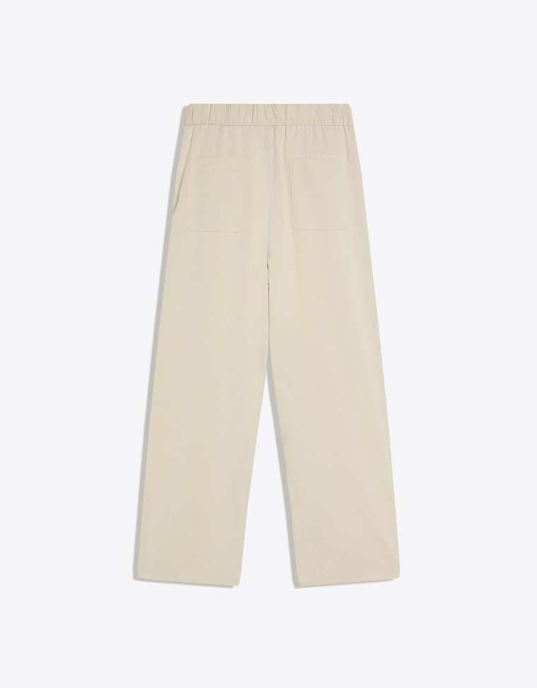 Объемные струящиеся брюки с защипами