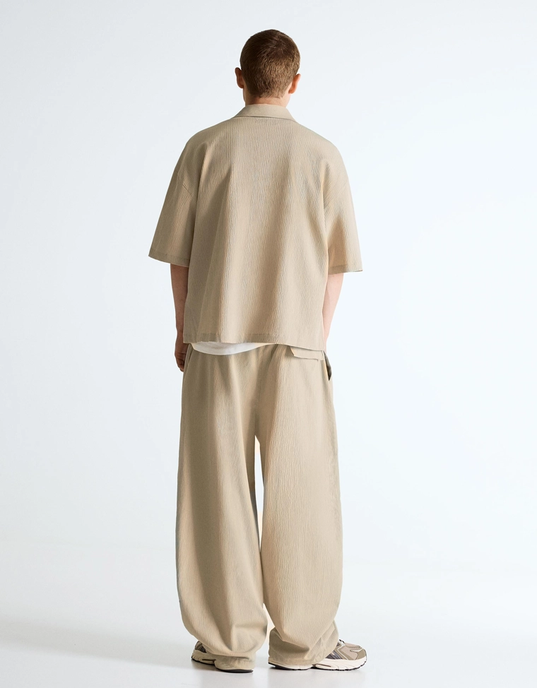 Плиссированные полуджоггеры объемного кроя