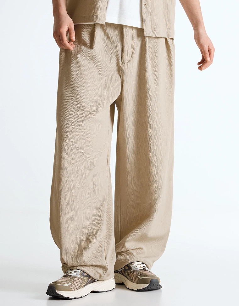 Плиссированные полуджоггеры объемного кроя