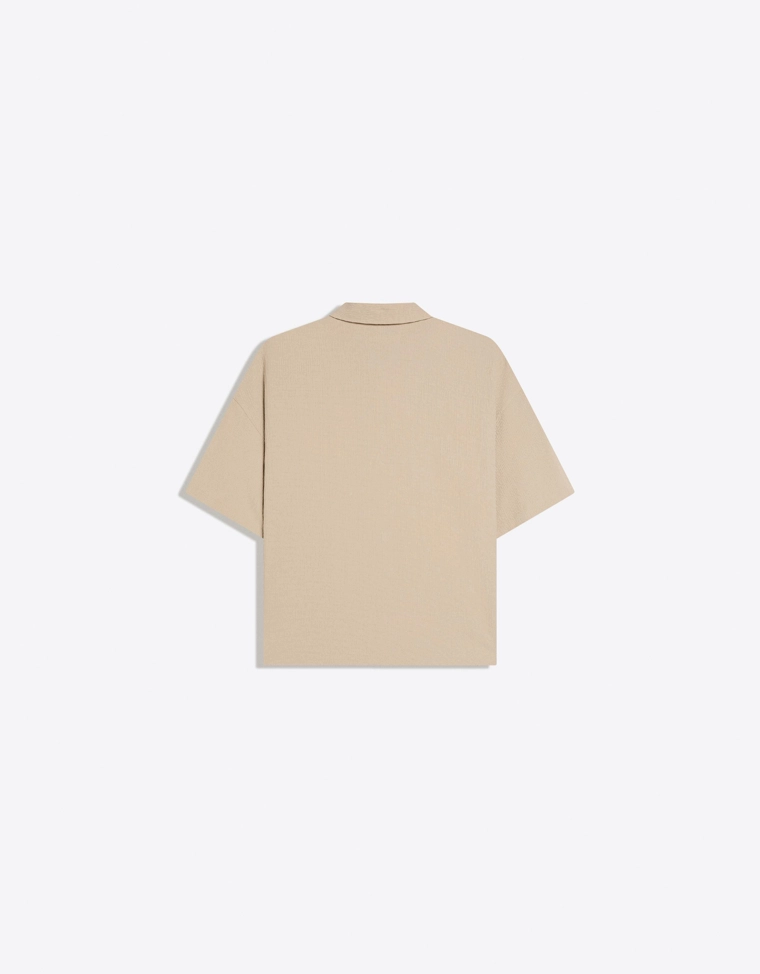 Рубашка геометрического кроя с короткими рукавами и складками