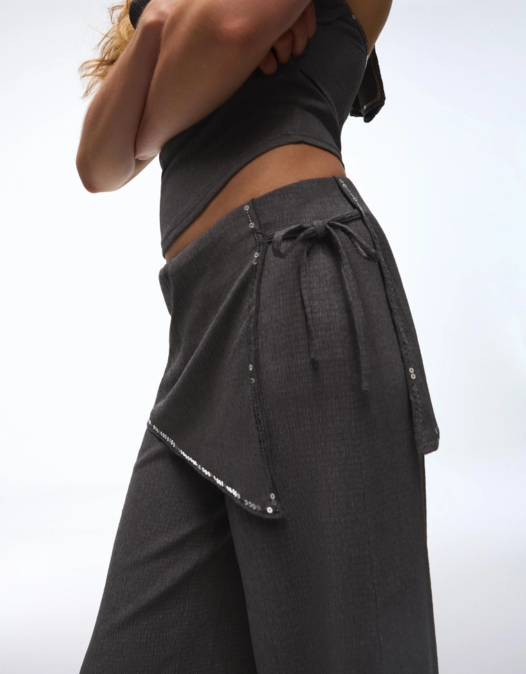 Брюки с юбкой с пайетками