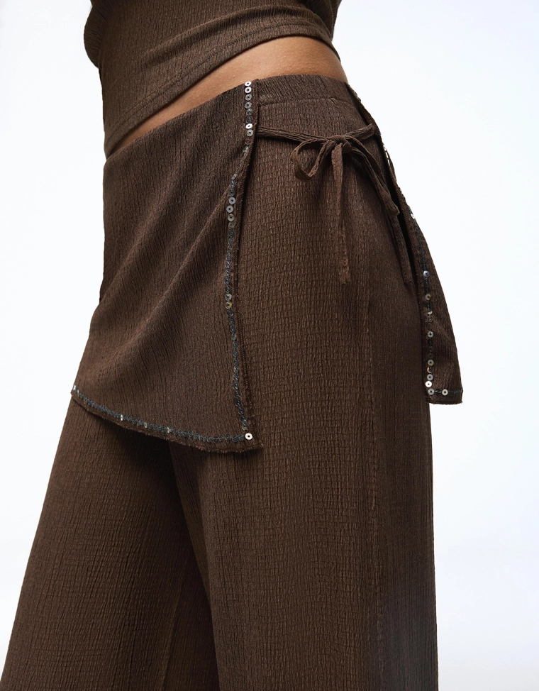 Брюки с юбкой с пайетками