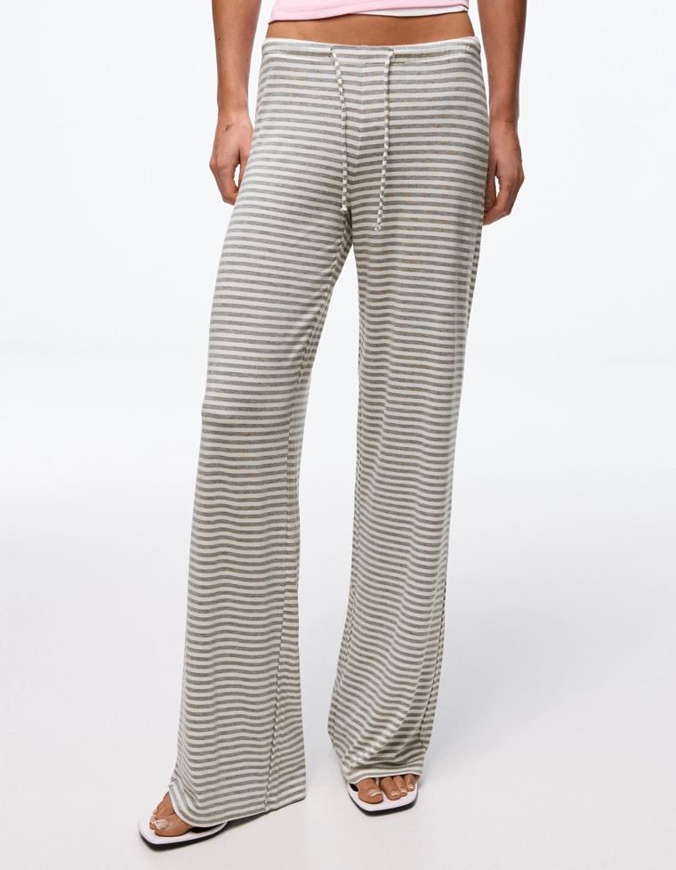 Брюки прямого кроя в полоску с принтом