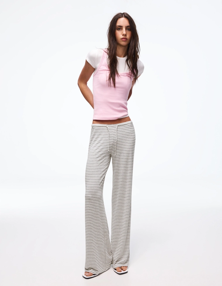 Брюки прямого кроя в полоску с принтом