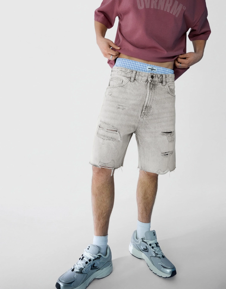 Джинсовые шорты с разрезами